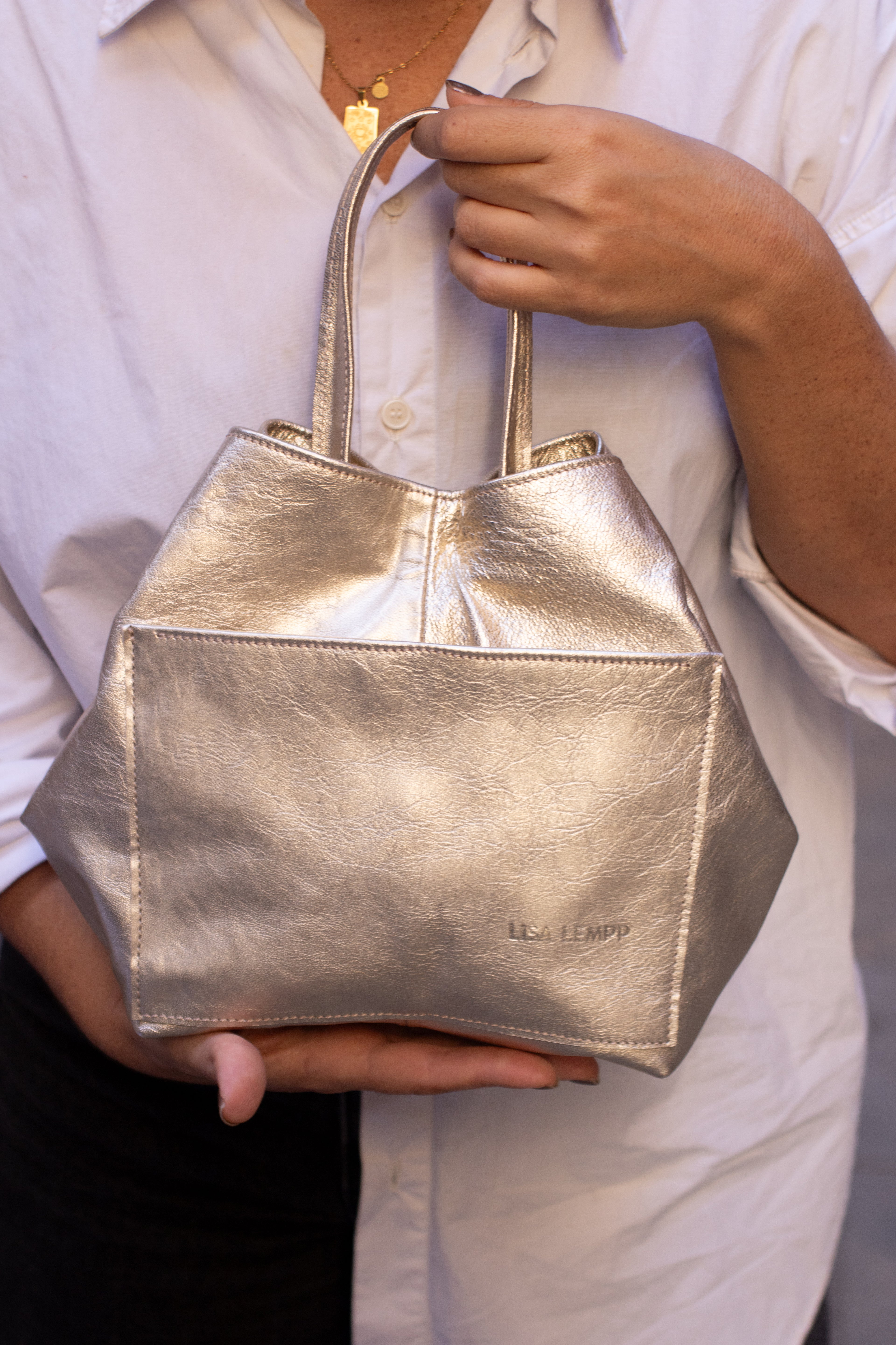 UMA  |  Bolso de mano  (CH)
